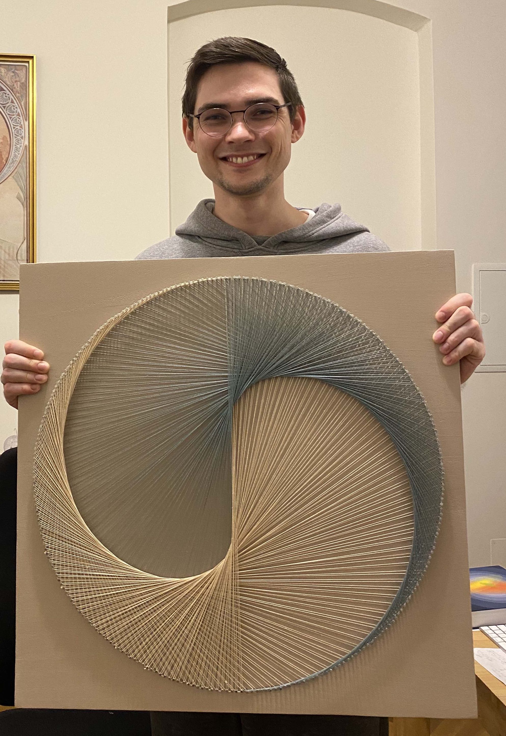 picture of myself and final string art piece